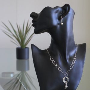 Mirzam - Kombination av halsband, berlock och örhängen. Glansig sterling silver med små och stora ringar, boll.